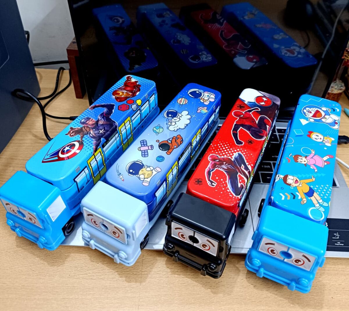 Gift Gallery Multicolour Cartoon Printed School Bus Matal Pencil Box with Moving Tyres and Sharpner for Kids  Multicolour - Image 1